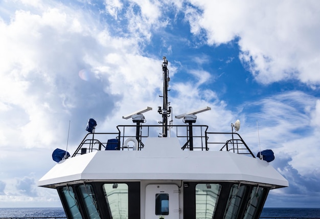 The superstructure of the bridge with the navigation tower of the tugboat