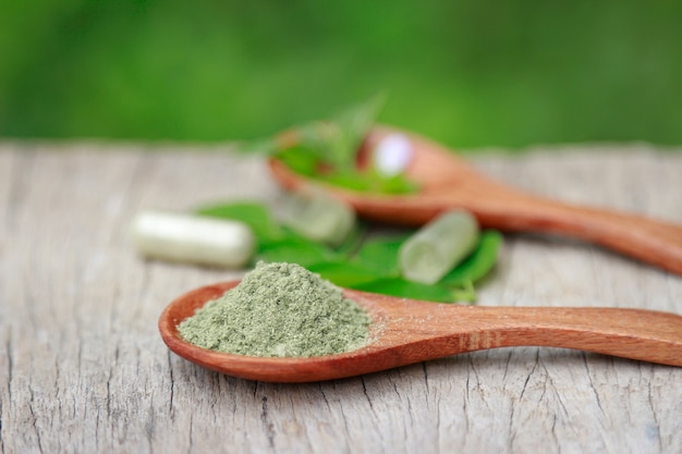 supplement capsules from organic herb for healthy eating 