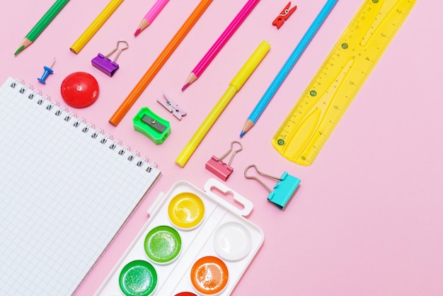 Supplies creative tools for school creative work on pink background