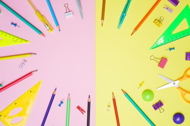 Supplies set on table creative tools for school creative work on yellow