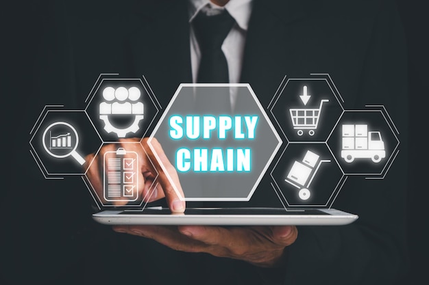 supply chain management concept businessman working on digital tablet with supply chain icon on virtual screen