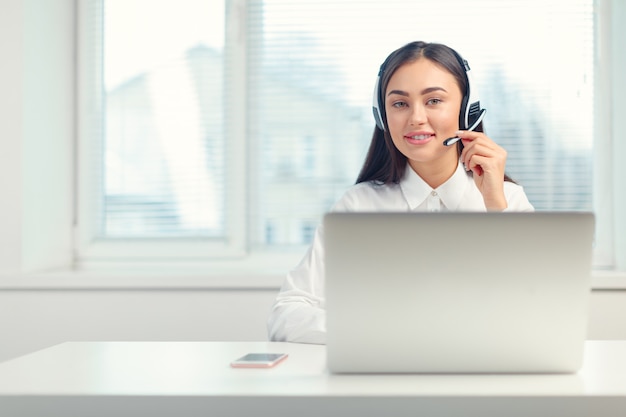 Support phone operator in headset at workplace