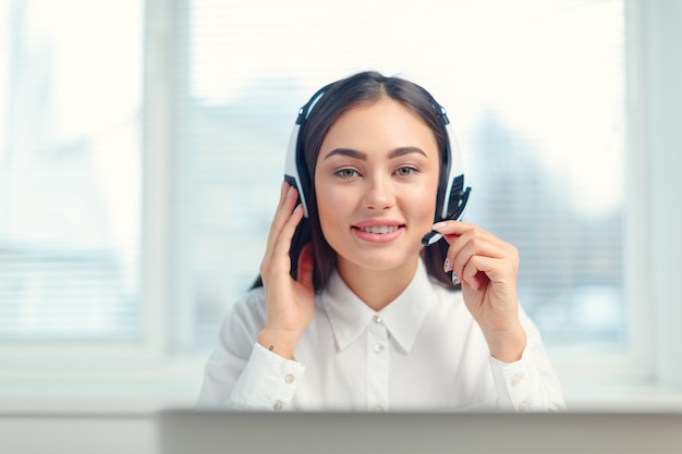 Support phone operator in headset at workplace