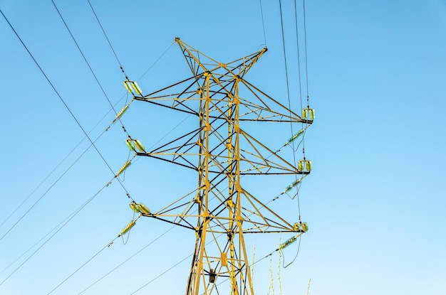 The support of the power line against the sky.