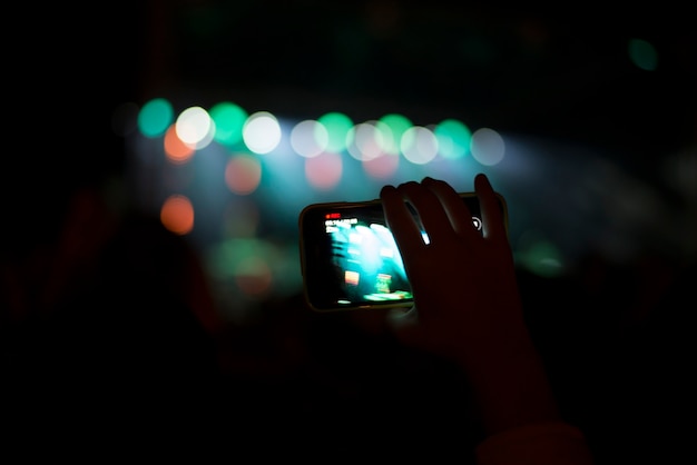 Supporters recording at concert