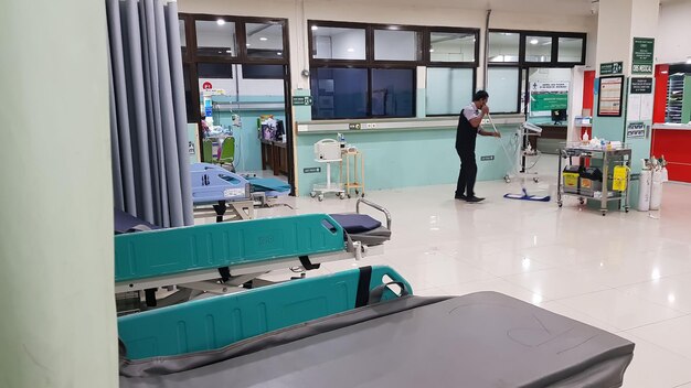 Surakarta Indonesia Jan 2023 Interior of recovery room in intensive care unit at Muwardi Hospital Empty bed with medical equipment in background