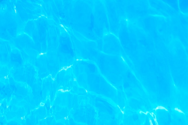 Surface of blue clear swimming pool