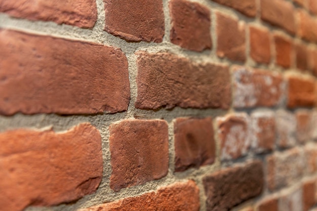 the surface of a brick wall construction repair and decoration of premises side view space for text background