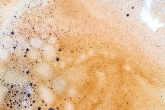 The surface of coffee foam Macro Abstract Detail texture close up background
