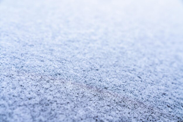 Photo surface covered with a layer of ice with a shallow depth of field