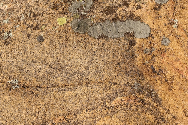 The surface of the granite rock as a natural background