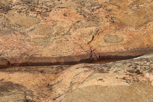 The surface of the granite rock as a natural background