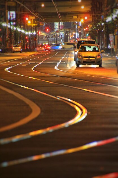 Surface level of vehicles on road along tram tracks