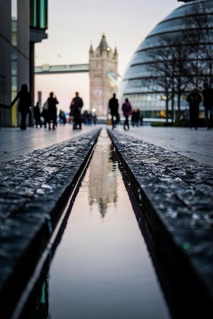 Surface level of water feature  amidst buildings in city