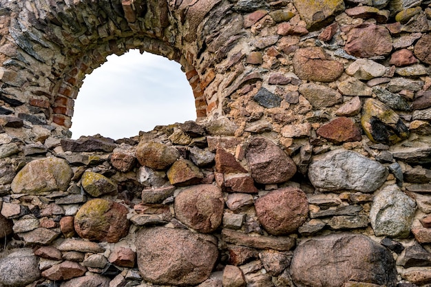 Surface of an old wall of huge stones of a destroyed building