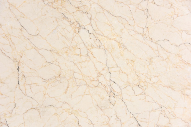 Surface in polished beige veined marble