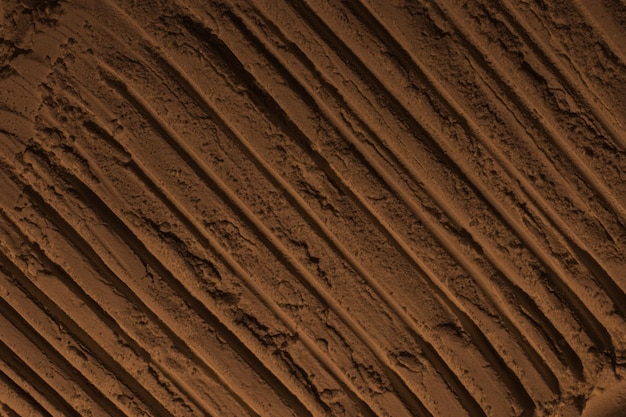 The surface of sand clay earth Wheel dents tire marks Craters depressions bulges Mars Planet