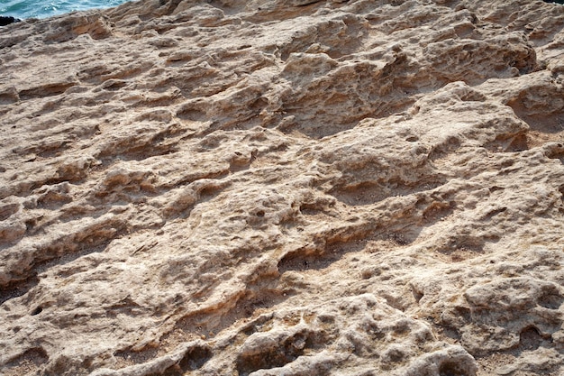 Surface sandy rock Rocky shore of the Caspian Sea