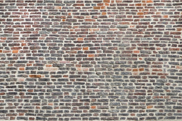 작은 갈색 벽돌의 표면
