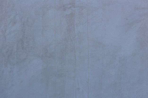 滑らかな灰色のセメントの壁のテクスチャ背景の表面。