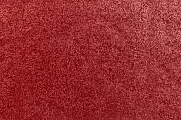 The surface and texture of old leather is red.