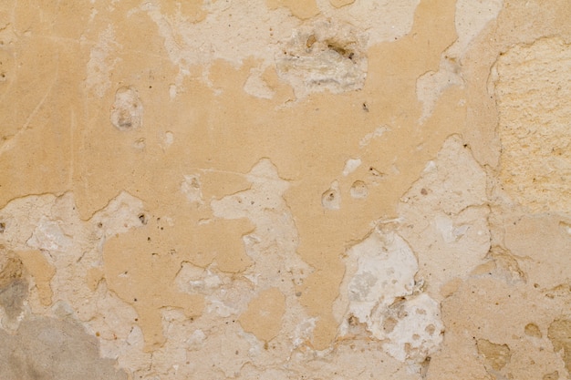 Photo surface of vintage stone wall at old street