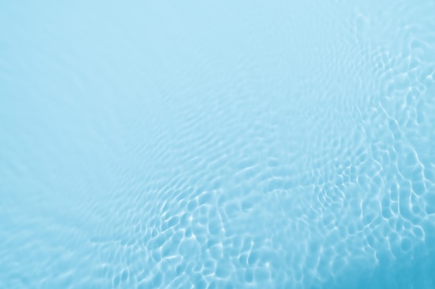 Surface of water blue wave background