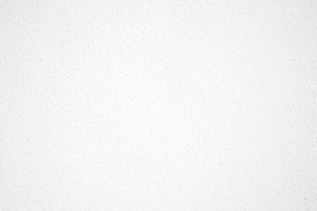 Surface of the White stone texture rough graywhite tone paint wall Use this for wallpaper or background image There is a blank space for text Seamless texture white for vintage