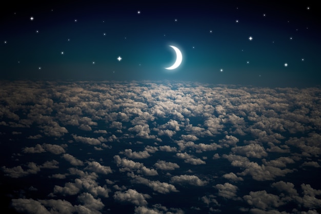 surfaces night sky with stars and moon and beautiful clouds