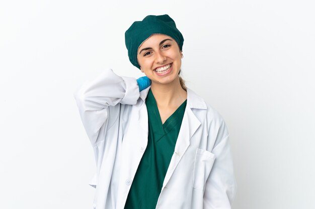 Surgeon caucasian woman isolated on white background laughing