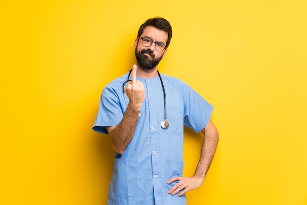 Surgeon doctor man making horn gesture