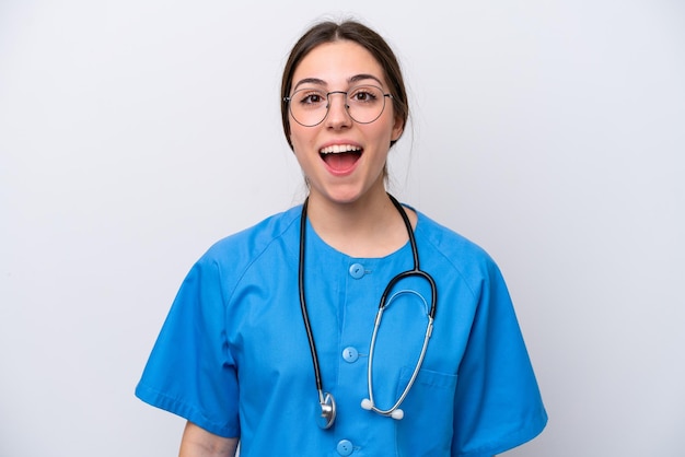 Surgeon doctor woman holding tools isolated on white background with surprise facial expression