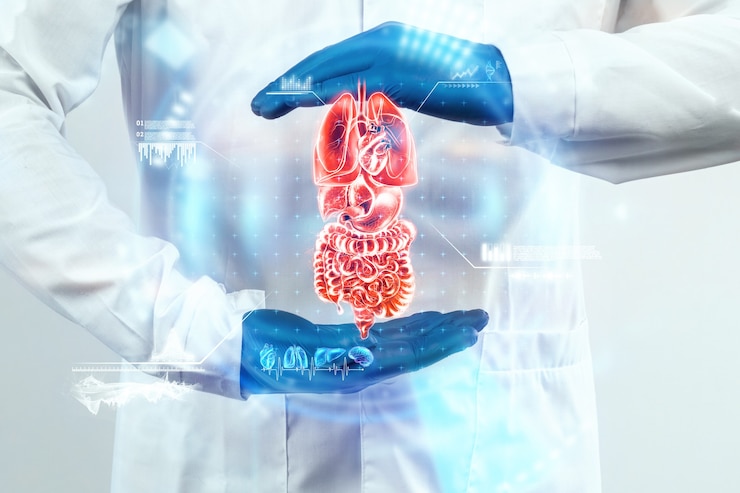Photo the surgeon looks at the hologram of internal organs, checks the test result on a virtual screen, and analyzes the data. internal bleeding, surgery, innovative technologies, medicine of the future.