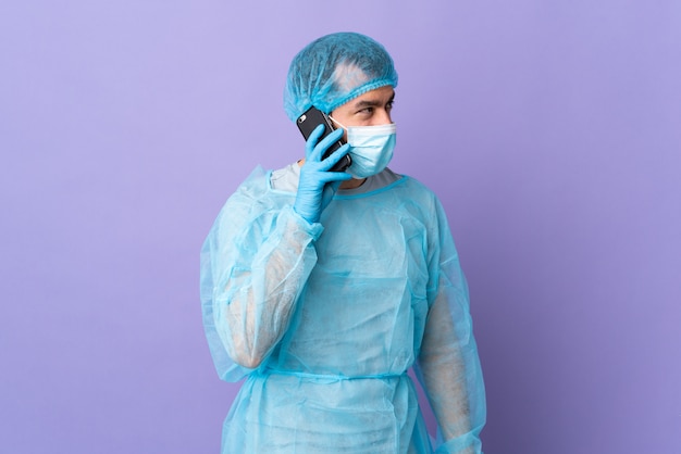 Surgeon man over isolated background