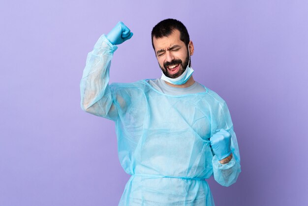 Surgeon man over isolated background