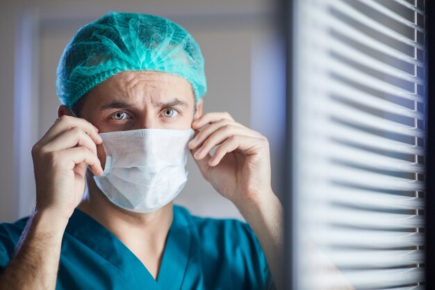 Surgeon in mask