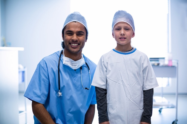 Surgeon and patient smiling at hospital