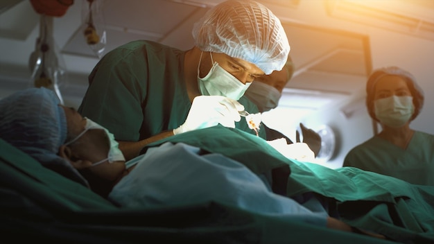 Photo a surgeon performing a surgical procedure concept hospital care