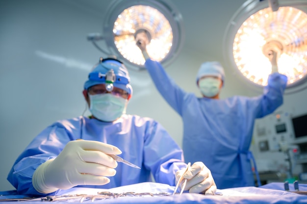 Surgeon and physician assistant team The instruments are being prepared for surgery in a hospital operating room.