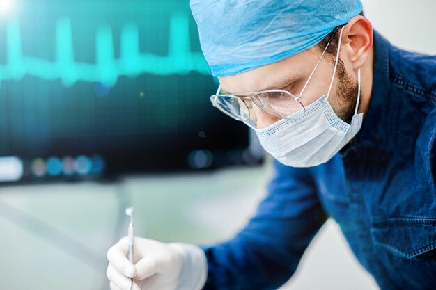 a surgeon in uniform and glasses operates the look of a surgeon doctor