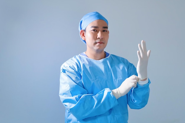 surgeon with surgical mask in Hospital Operating Theater.