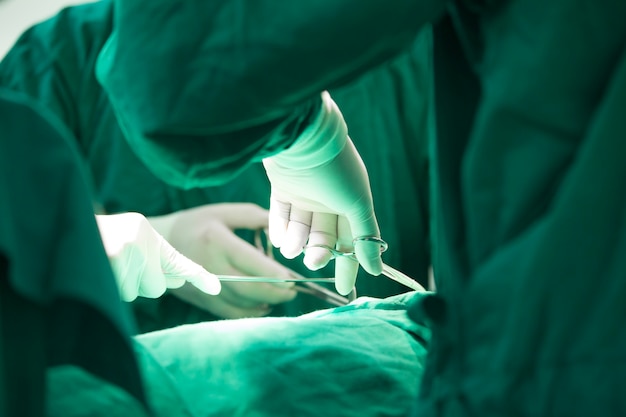 The surgery team working together at the operating room in the hospital