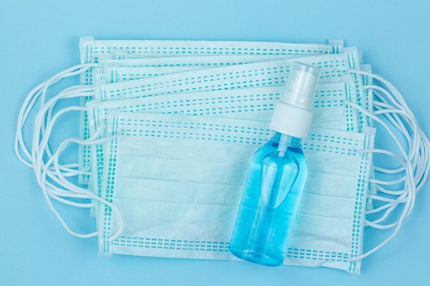 Surgical mask for wearing germ protection and gel alcohol or\
hand sanitizer bottle for washing hand