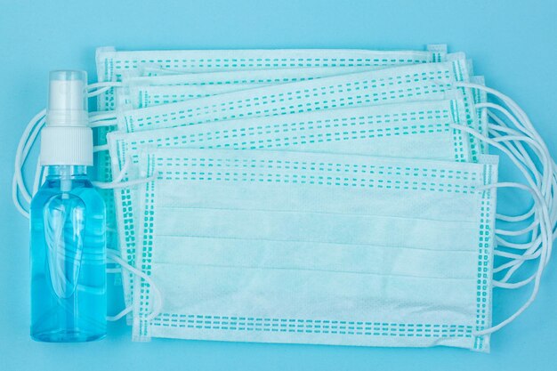 Surgical mask for wearing germ protection and gel alcohol or\
hand sanitizer bottle for washing hand