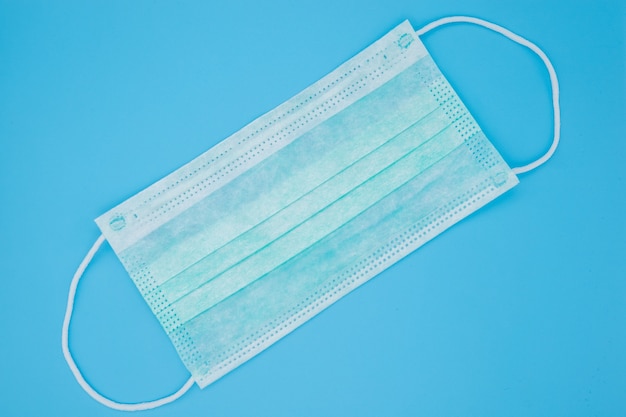 Surgical mask with rubber ear straps