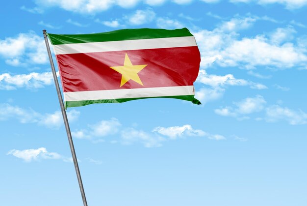 suriname 3D waving flag on a sky blue with cloud background image