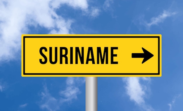 Suriname road sign on sky background