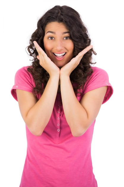 Surprised brown haired woman posing