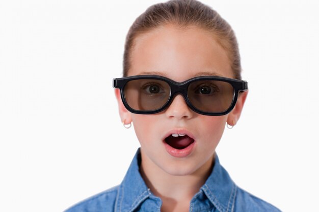 Surprised girl wearing sunglasses