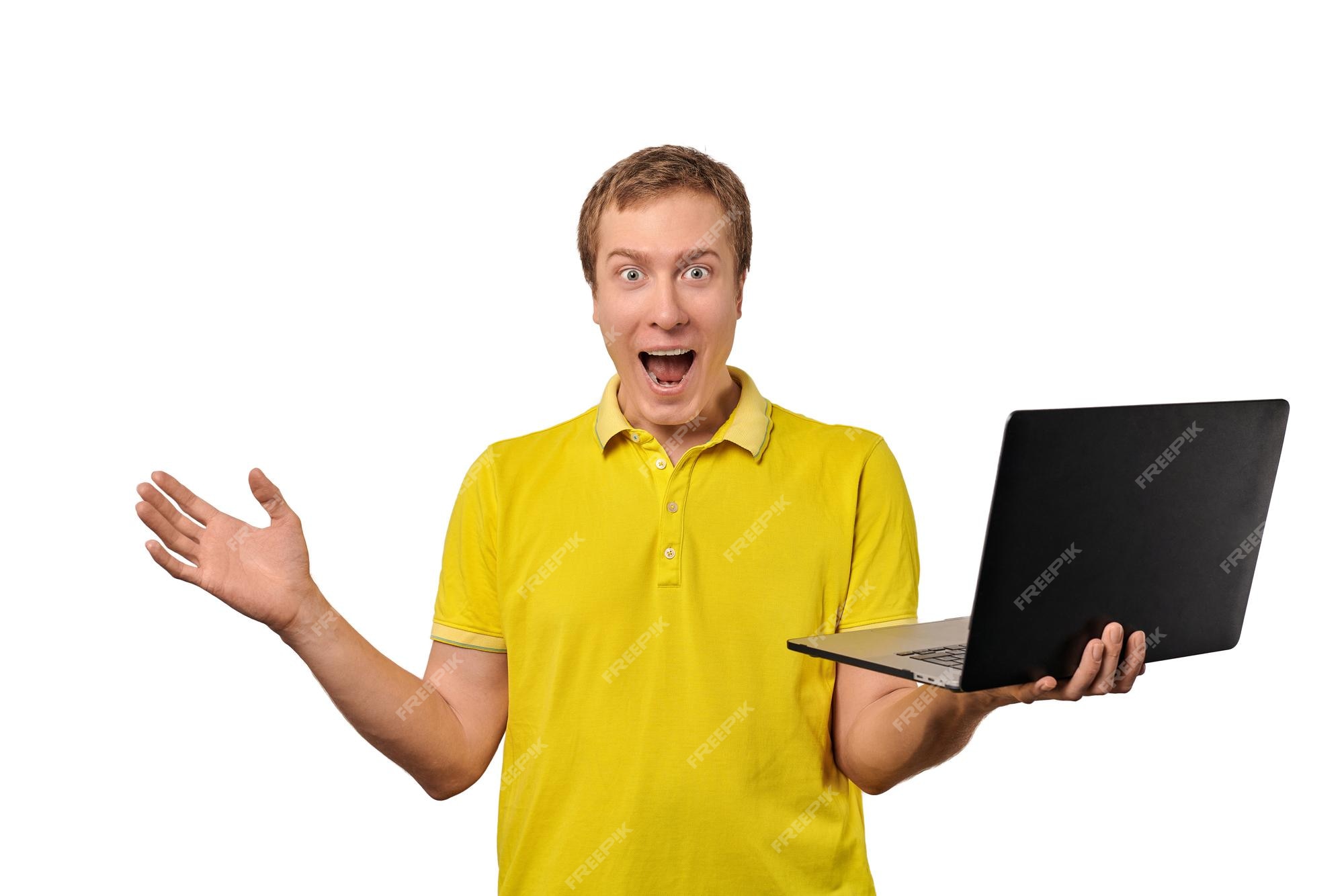 Premium Photo | Surprised happy male with laptop in hand isolated on white  background funny shocked young man in yellow tshirt holds notebook in hand  funny guy with happy look face due to sales discounts